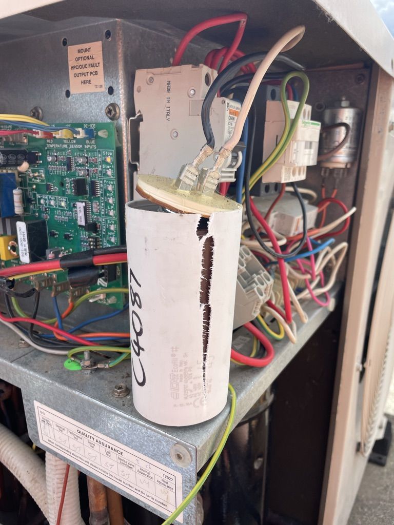 Failed air-conditioning capacitor identified during an emergency repair